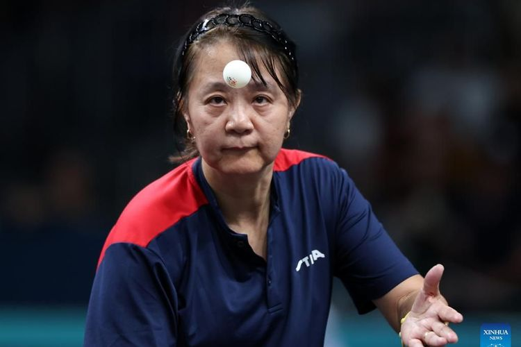 Zeng Zhiying dari Chile bertanding dalam pertandingan penyisihan tunggal putri tenis meja melawan Zeng Zhiying dari Chile di Olimpiade Paris 2024 di Paris, Prancis, pada 27 Juli 2024. (Xinhua/Wang Dongzhen).(Xinhua/Wang Dongzhen)